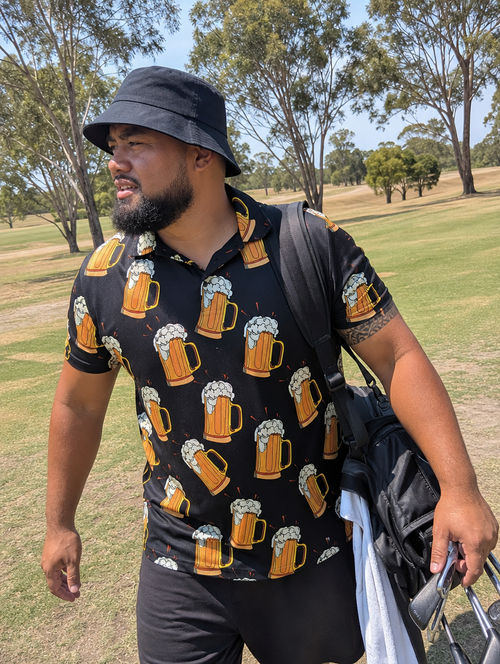 Samoan-Australian golfer walking the fairway in the Back Nine Blackout polo
