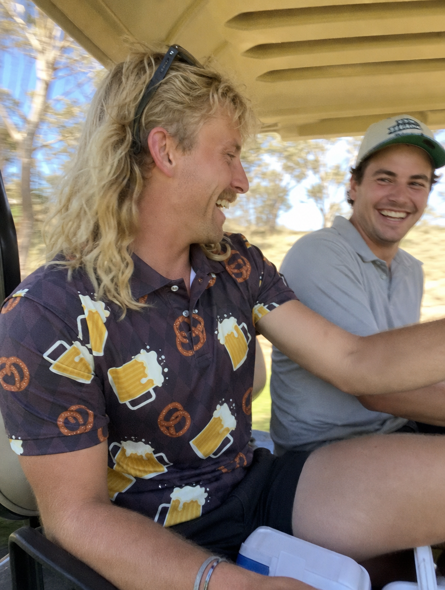 Two mates in a buggy wearing The Argyle Incident polo